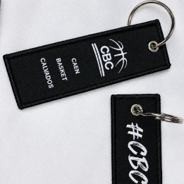 Porte-clé tissé noir et blanc avec logo du CBC